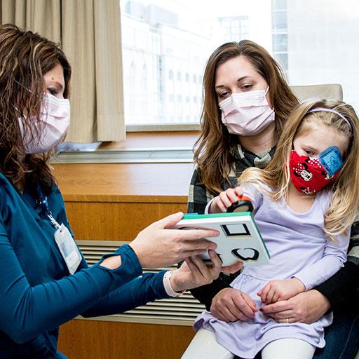 Orthoptic student performing eye exam during Orthoptic Program at Mayo Clinic in Rochester, MN