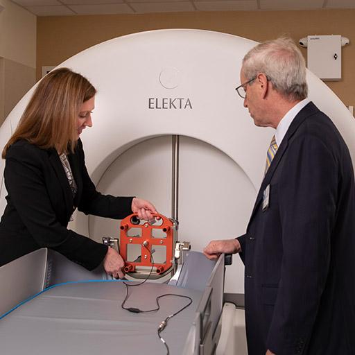 Mayo Clinic medical physicists testing a therapy tool