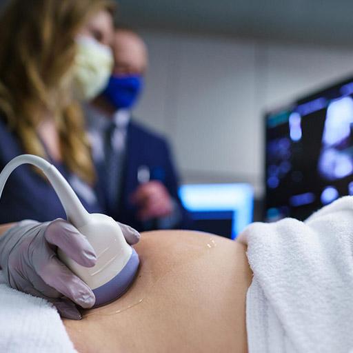 Abdominal Imaging fellow conducts an ultrasound assessment on a patient at Mayo Clinic in Rochester, Minnesota.