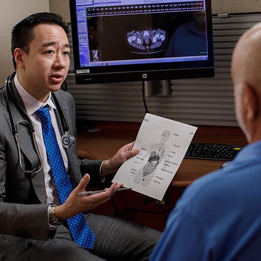 Mayo Clinic oncologist working with a patient