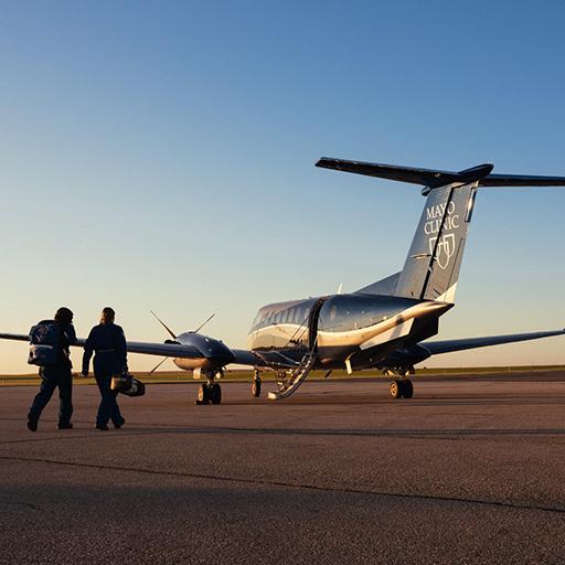 The Aerospace Medicine Fellows boarding Mayo One.