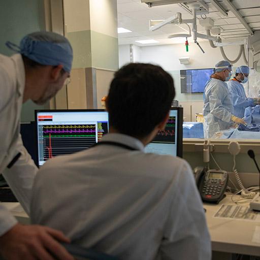 Advanced Heart Failure and Transplant Cardiology fellow working with a cardiologist in the OR at Mayo Clinic in Jacksonville, Florida.