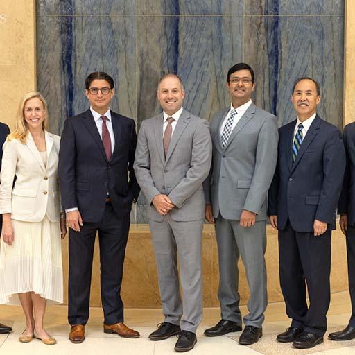 Jose Ruiz Morales, MD, 2023 graduate of the Advanced Heart Failure and Transplant Cardiology Fellowship program, gathers for a photo with the staff consultants.