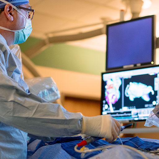 Physicians working on a patient in Mayo Clinic Electrophysiology Laboratory