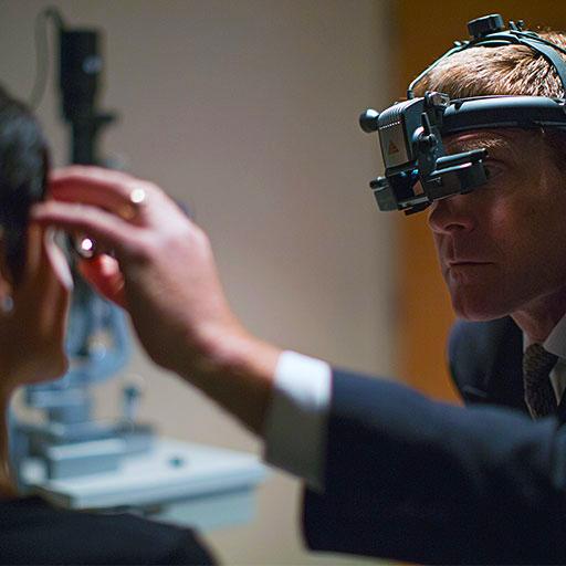 Medical retina fellow works with a patient at Mayo Clinic in Rochester, Minnesota.