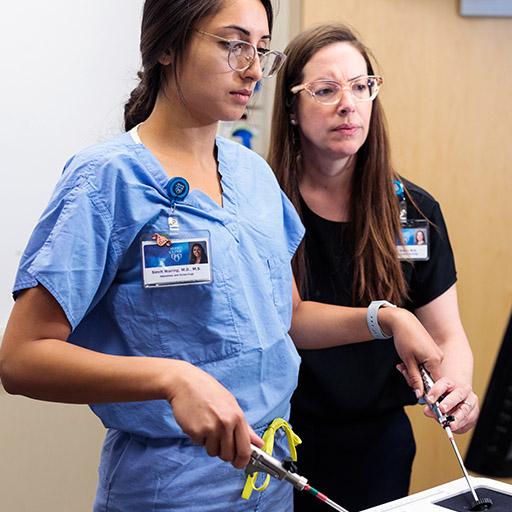 Mayo Clinic gynecologic surgeons practicing a procedure