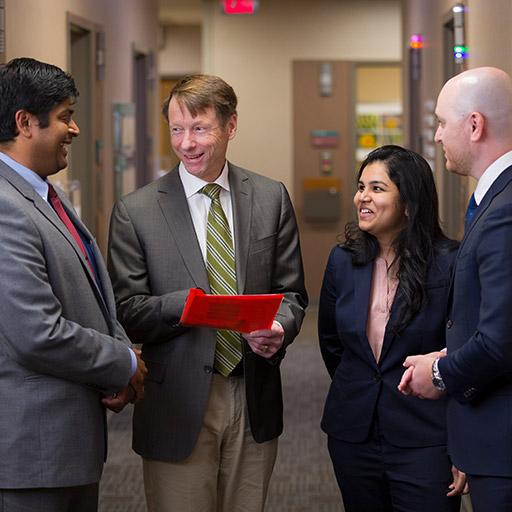 Nephrology fellows and faculty conversing in the hall at Mayo Clinic in Phoenix, Arizona.