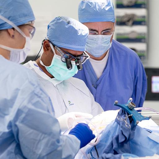 Mayo Clinic neurosurgical resident using surgical navigation instrumentation in the operating room