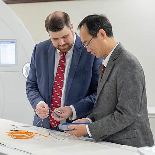 Mayo Clinic Neuroradiology fellows working together.