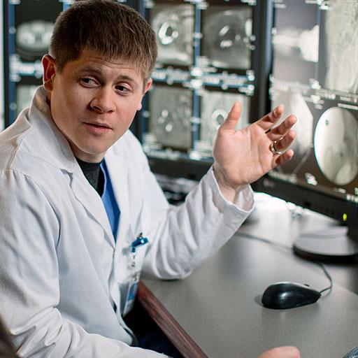 Physicians examine scans for orthopedic infection