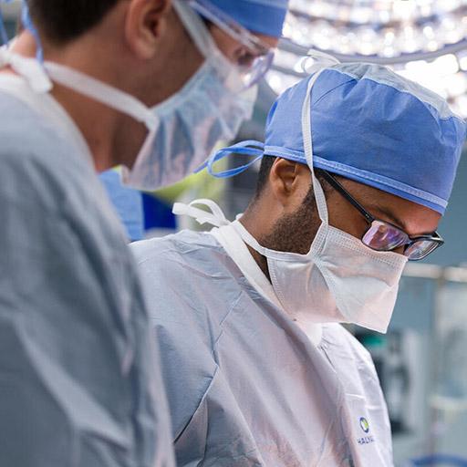 Orthopedic resident assists with a surgery at Mayo Clinic in Phoenix, Arizona.