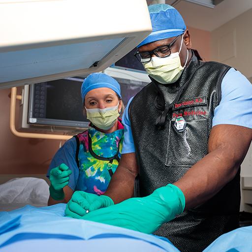 3 pain medicine fellows at work