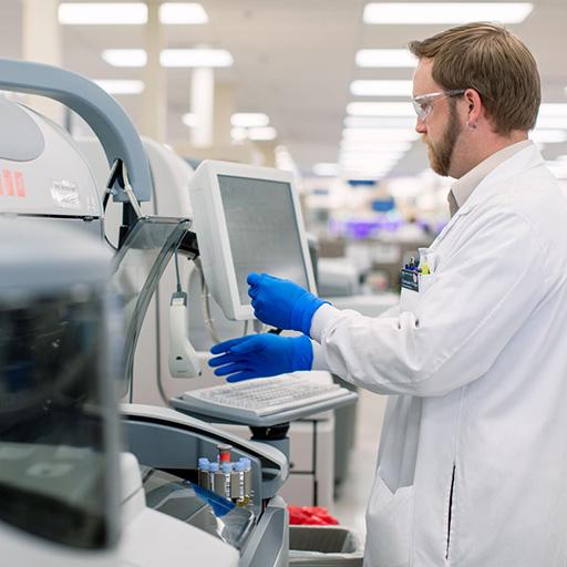 A person reviewed results in a Department of Laboratory Medicine and Pathology laboratory.