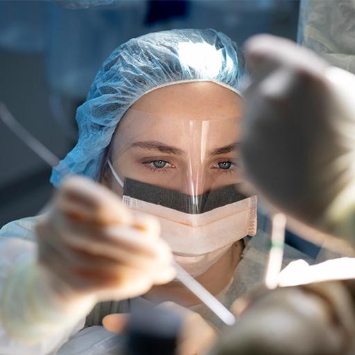 A plastic surgery resident performing a procedure.