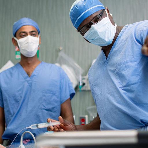 Mayo Clinic anesthesiology residents prepping a patient for surgery