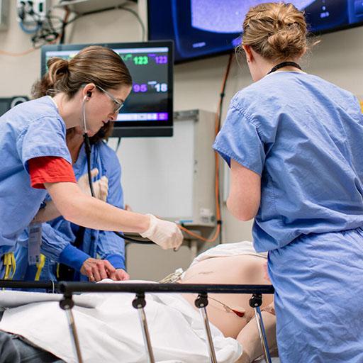 Mayo Clinic emergency medicine residents completing a simulation center training scenario