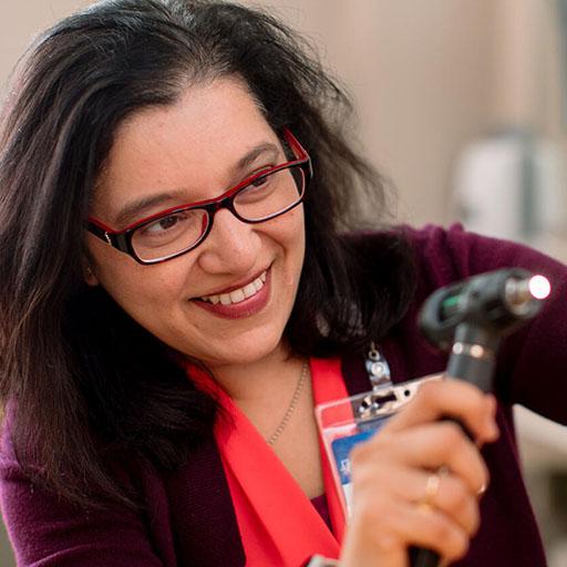 Family medicine physician examining a patient