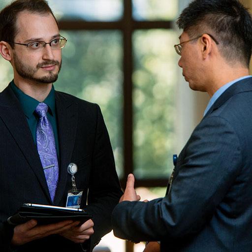 Mayo Clinic faculty speaking with psychiatry and psychology residents