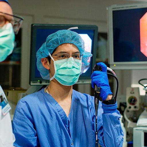 Mayo Clinic pulmonary medicine fellows examining a patient