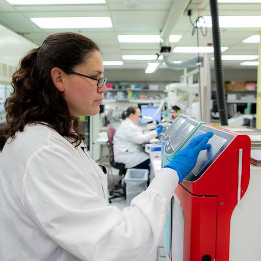 Two people working in a pathology lab.