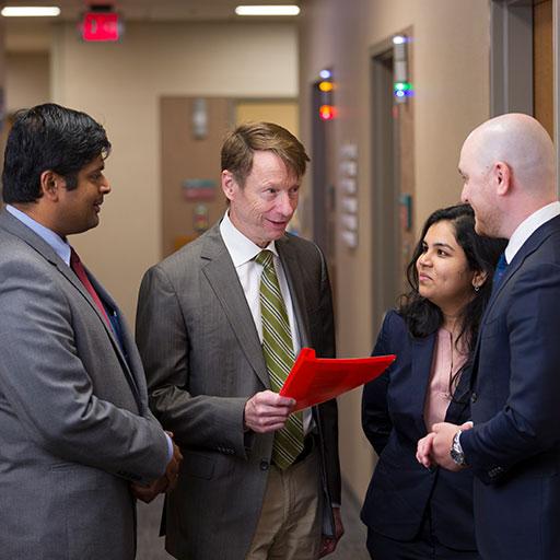 Renal Transplant fellows discuss a case together.