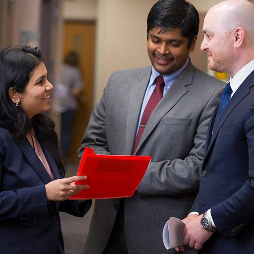 Renal transplant fellows collaborating in the hallway