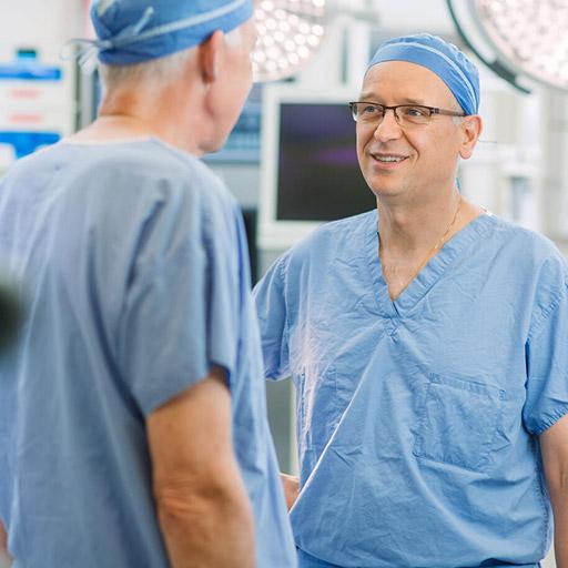 Cardiovascular surgeons Alberto Pochettino, M.D. (right), and Richard C. Daly, M.D.