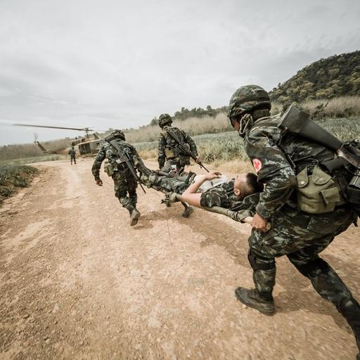 Medics moving a patient