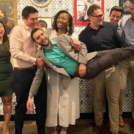 Residents from Mayo Clinic's Internal Medicine Residency program in Arizona being playful and carrying a fellow resident.