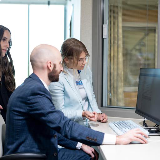 Pharmacy residency work together on drug-related research on the computer in the clinic at Mayo Clinic