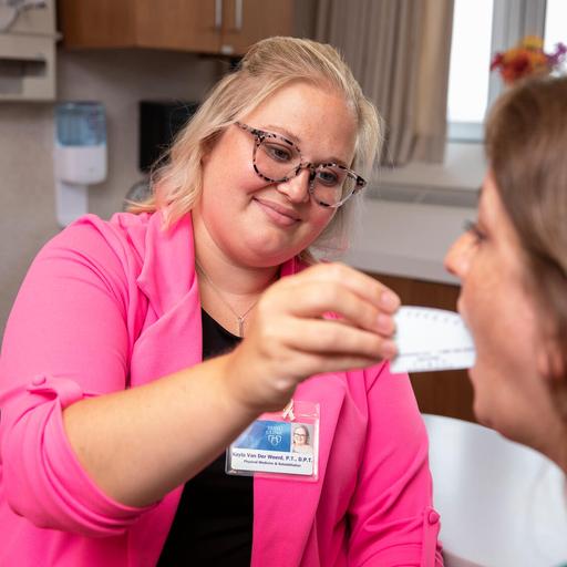 A doctor working with a patient.