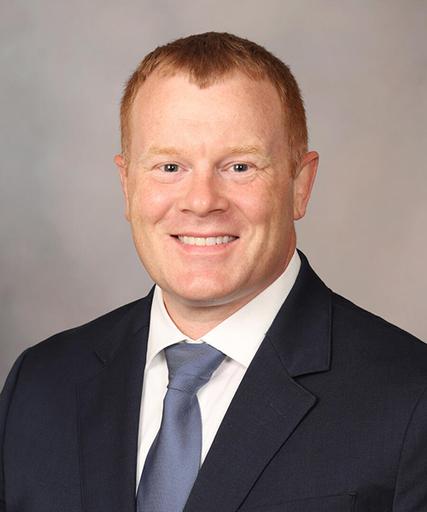 Mel Helgeson, M.D.