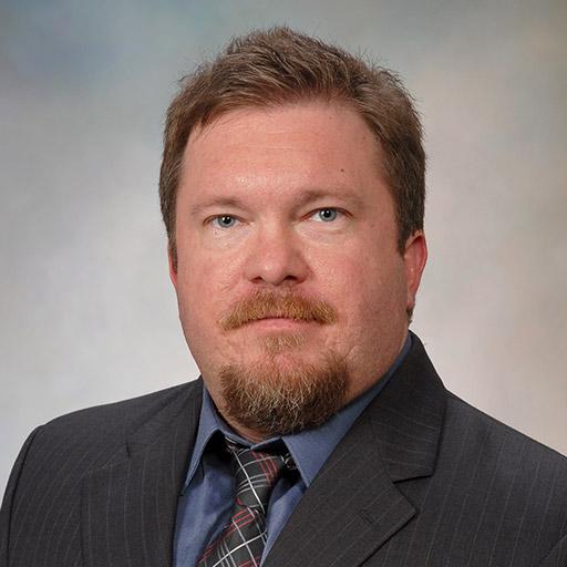 Thomas Caulfield, Ph.D.