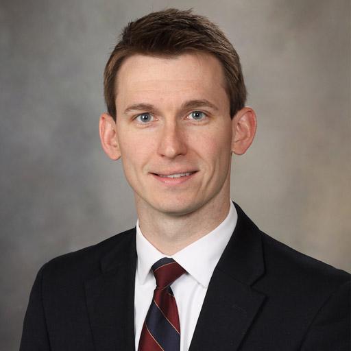 Brett Bezak, D.M.D., M.D. 