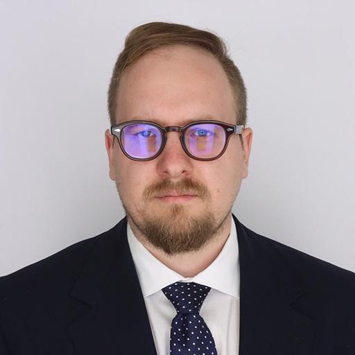 John Spigos, M.B., Ch.B.