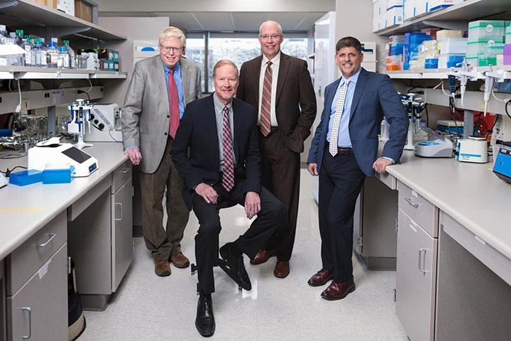 Physicians from the Mayo Clinic Graduate School of Biomedical Sciences (MCGSBS) expansion group gather for a photo.