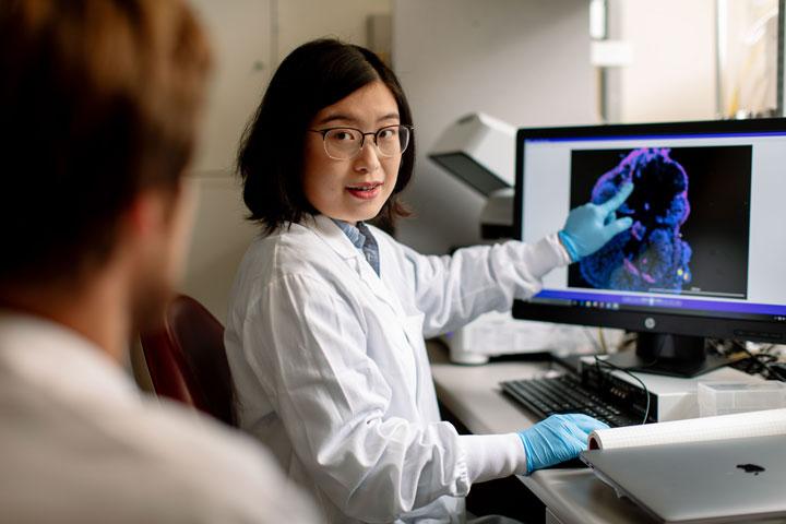 Scientist mentoring a graduate student