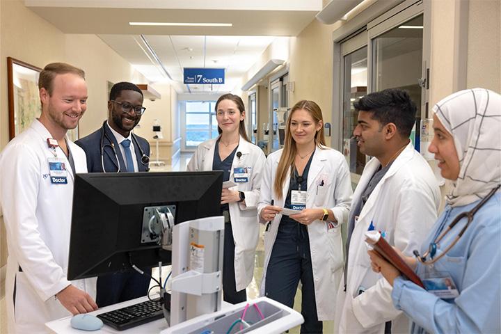 Mayo Clinic fellows and residents on rounds in a hospital
