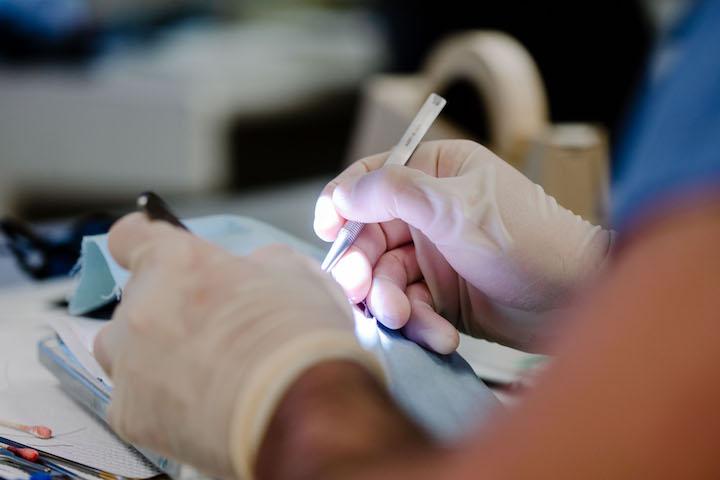 A trainee practices microsurgery at the Mayo Clinic Microsurgery Training Center.