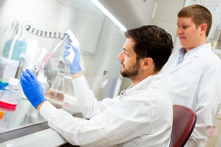 Mayo Clinic Ph.D. Program student pipetting specimen in research laboratory