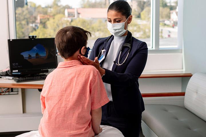 Anupama Ravi, M.D. with Allergy and Immunology Fellowship in Rochester, Minnesota examines a patient.