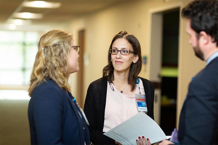 Child and Adolescent Psychiatry residents collaborating in the hallway at Mayo Clinic in Rochester, Minnesota.