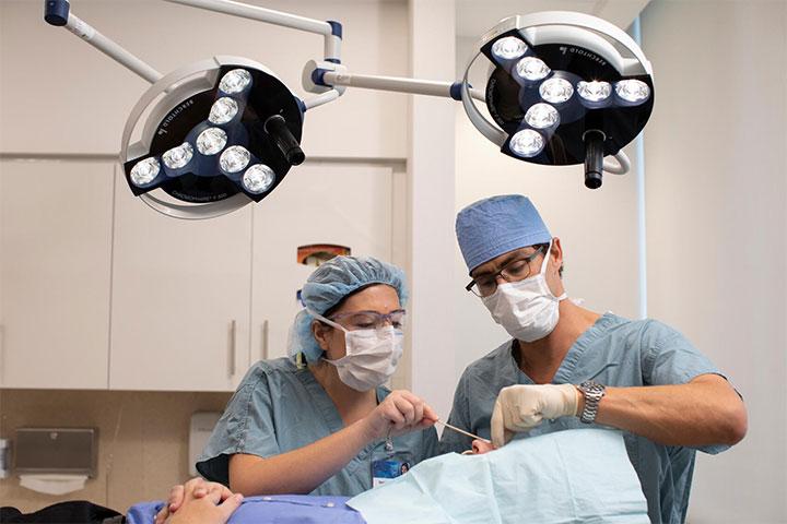 Dermatology trainees in the procedure room