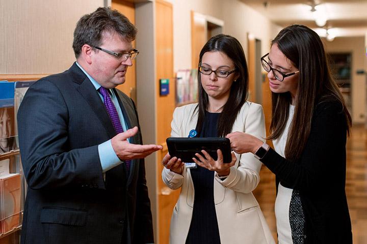 Motility fellows and faculty collaborate together in the hallway at Mayo Clinic in Rochester, Minnesota.