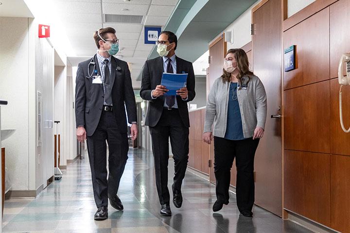 Pancreatology fellows collaborating in the hall at Mayo Clinic in Rochester, Minnesota.