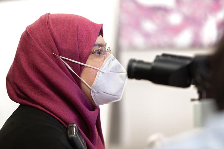 A Genitourinary Pathology fellow attends a conference