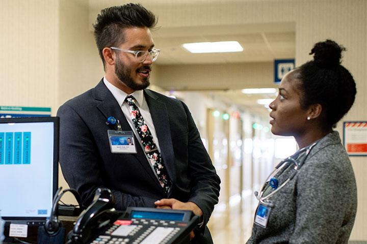 Residents talking to each other in the hallway