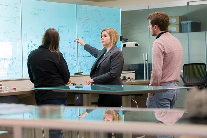 Neuro-oncology faculty member speaks with fellows at Mayo Clinic in Phoenix, Arizona.