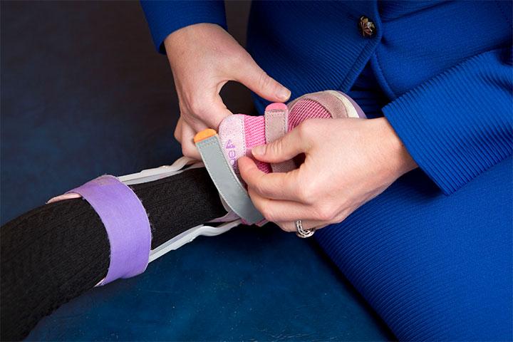 A Pediatric Rehabilitation Medicine fellow helps a patient with cerebral palsy at Mayo Clinic in Rochester, Minnesota.