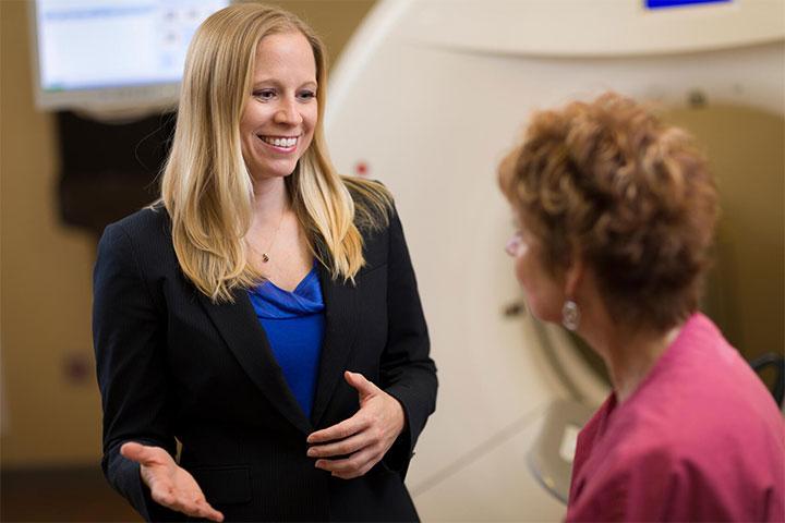 Dr. McGee, Associate Program Director, speaking with a patient at Mayo Clinic in Phoenix, Arizona.